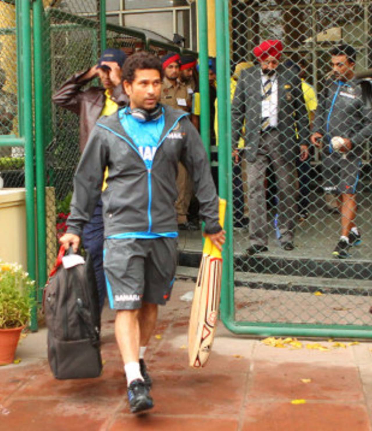 Sachin Tendulkar and members of the Indian team leave the stadium after the first day's play was washed out, India v Australia, 3rd Test, 1st Day, Mohali, March 14, 2013