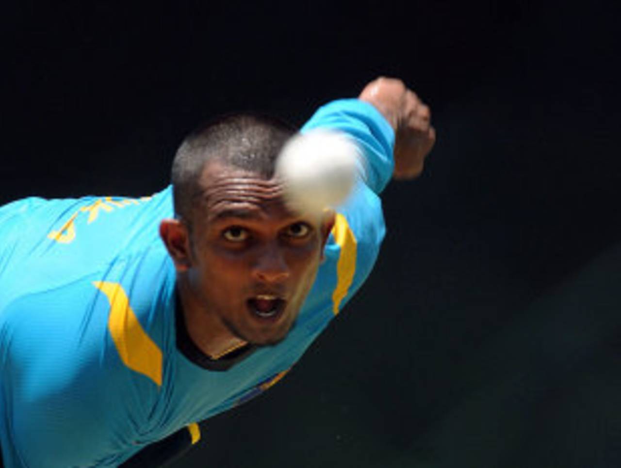 Ishan Jayaratne bowls during a practice session in Pallekele before the T20 match between Sri Lanka and Bangladesh, March 30, 2013