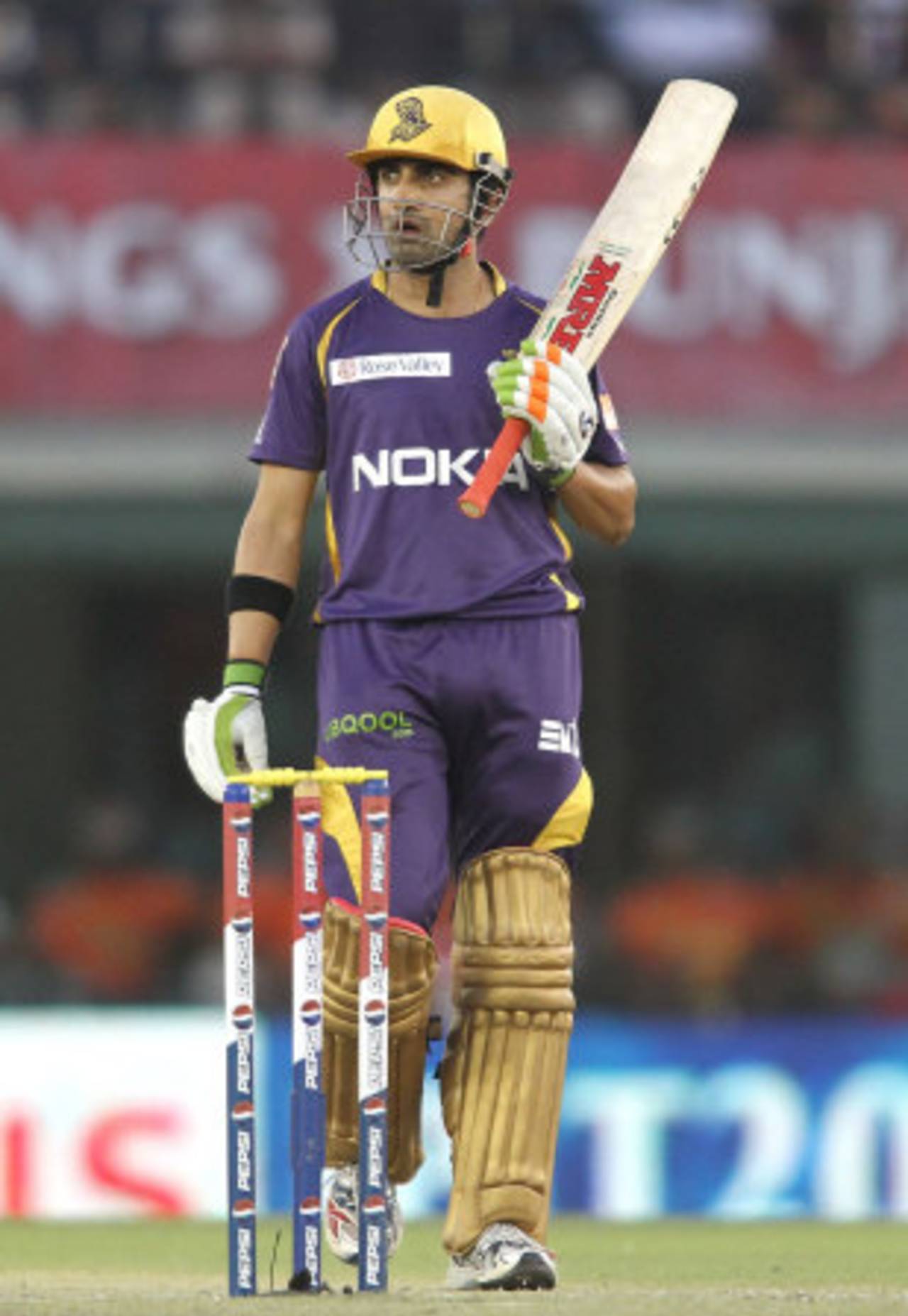 Gautam Gambhir raises his bat after scoring his third consecutive fifty, Kings XI Punjab v Kolkata Knight Riders, IPL 2013, Mohali, April 16, 2013
