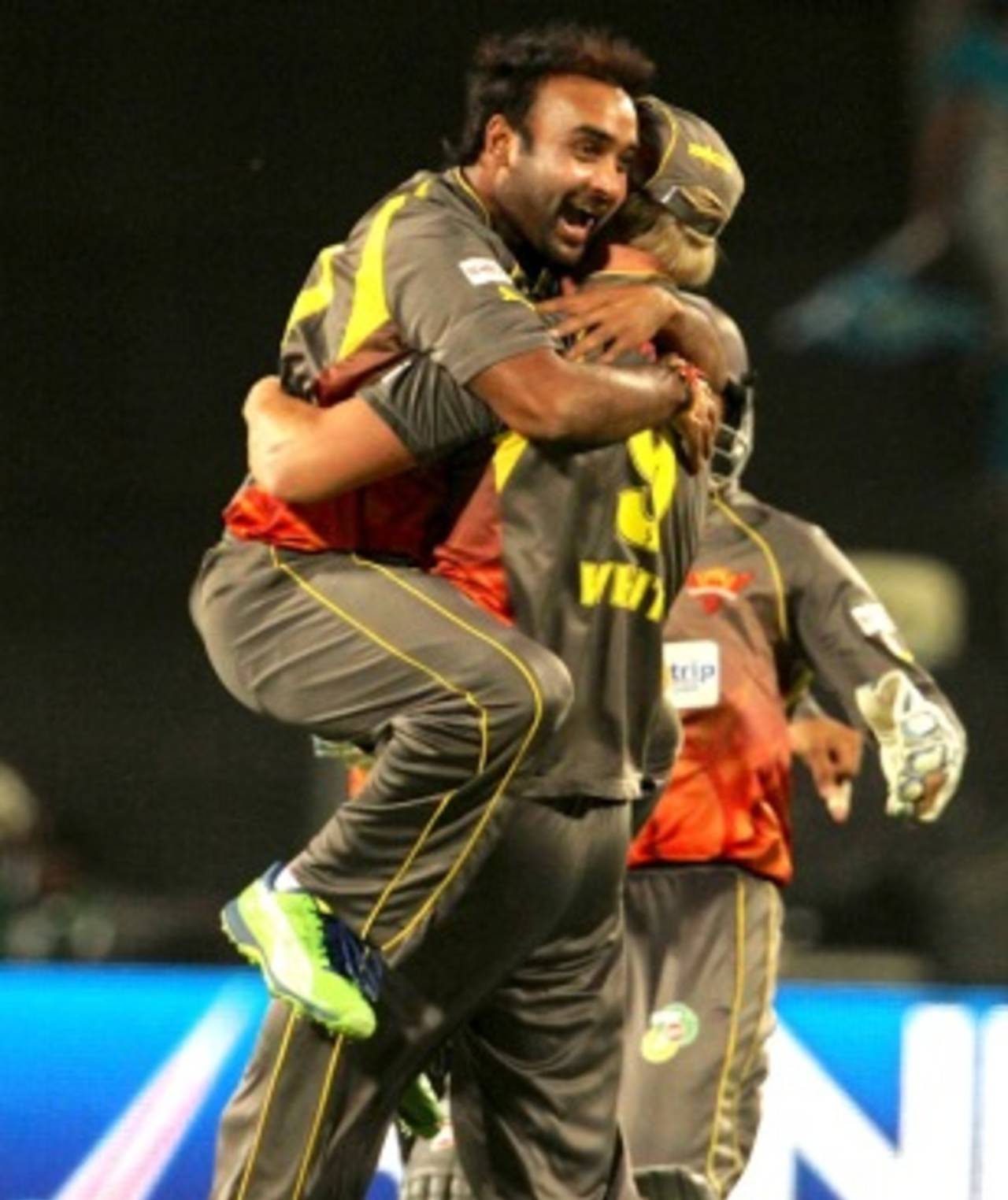 Amit Mishra leaps on to Cameron White after his hat-trick, Pune Warriors v Sunrisers Hyderabad, IPL, Pune, April 17, 2013