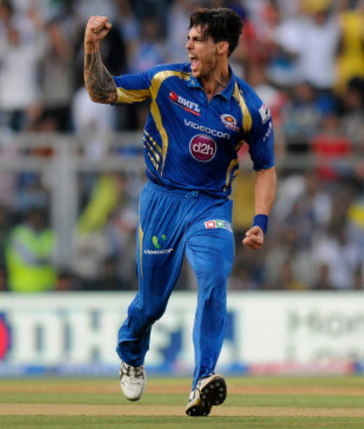 Mitchell Johnson celebrates a wicket, Mumbai Indians v Chennai Super Kings, IPL, Mumbai, May 5, 2013