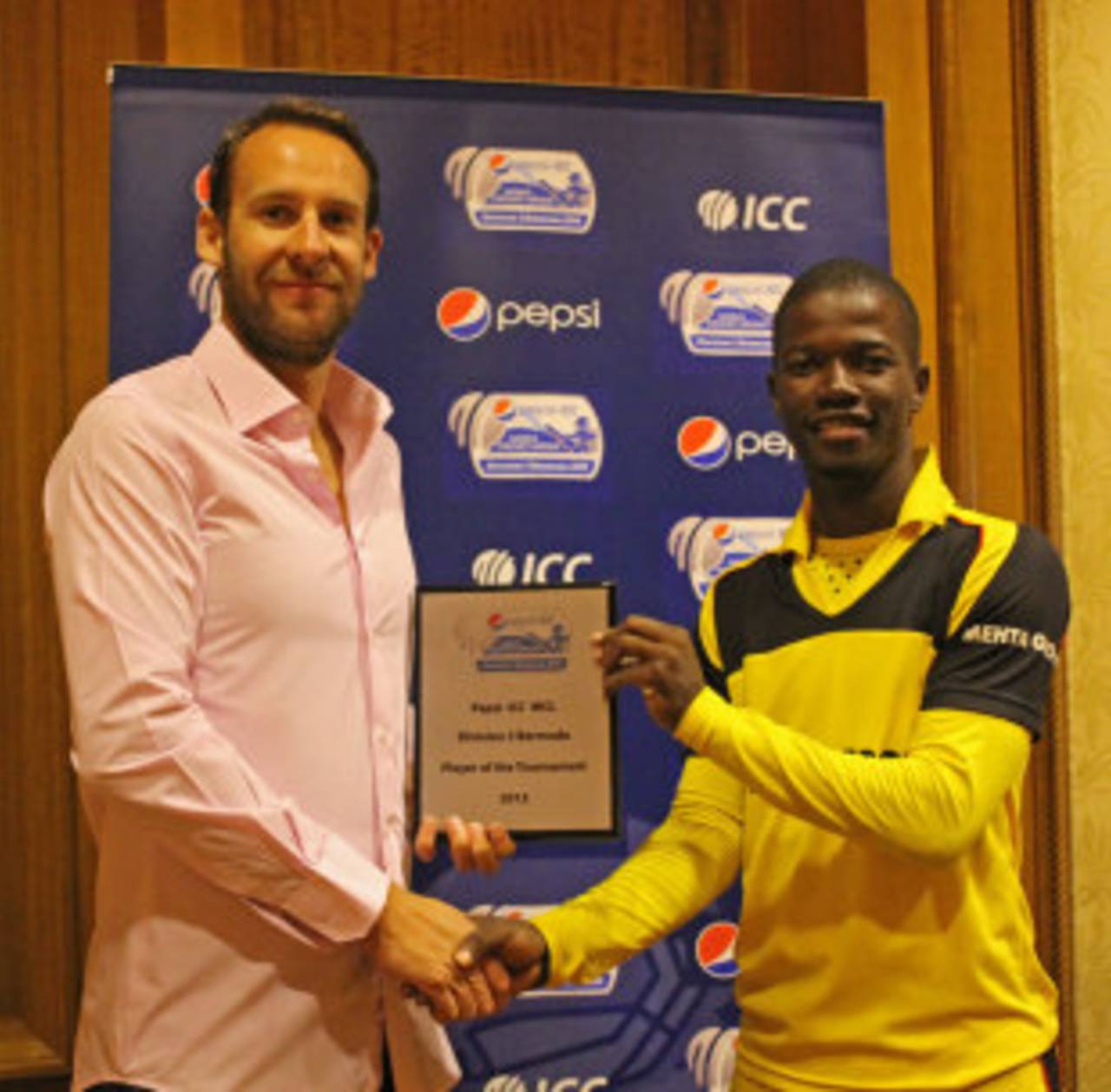 Uganda captain Davis Arinaitwe collects his Player of the Series award, Nepal v Uganda, World Cricket League Division 3, final, Hamilton, May 5, 2013