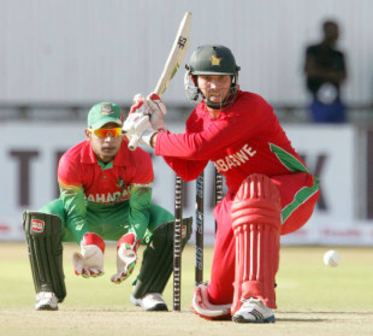 Brendan Taylor plays a sweep shot during his innings of 15