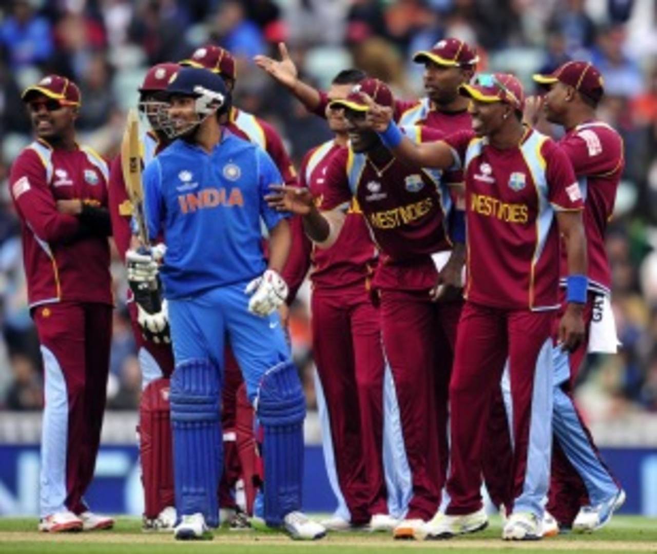 West Indies players joke with Rohit Sharma while waiting for the third umpire's decision, India v West Indies, Champions Trophy, Group B, The Oval, June 11, 2013
