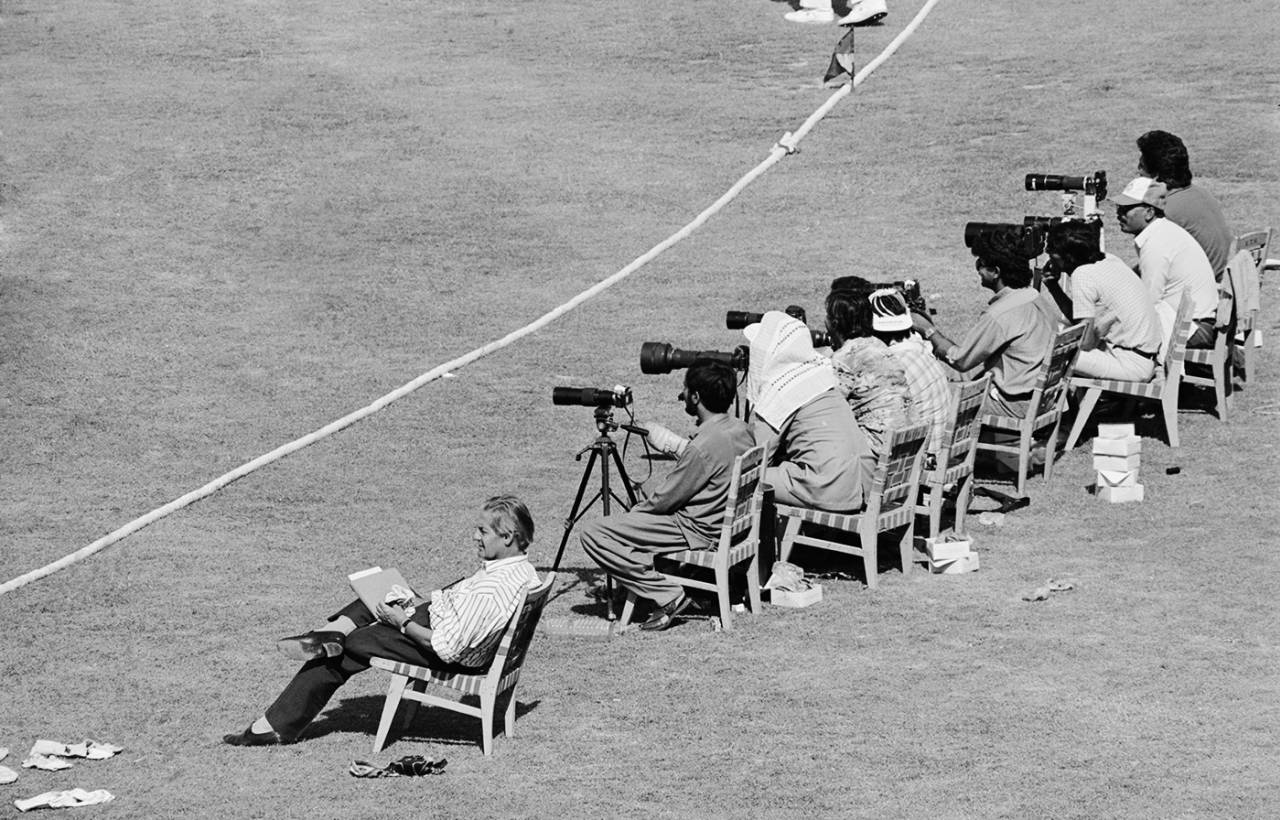Woodcock (far left), on his last official tour as cricket correspondent of the Times, sits behind the boundary at the Lahore Test of 1987&nbsp;&nbsp;&bull;&nbsp;&nbsp;Adrian Murrell/Getty Images