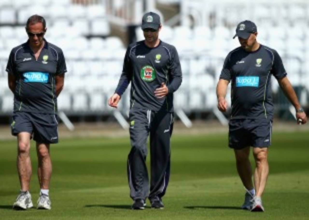 Michael Clarke with physiotherapist Alex Kontouris and team doctor Peter Brukner, July 7, 2013