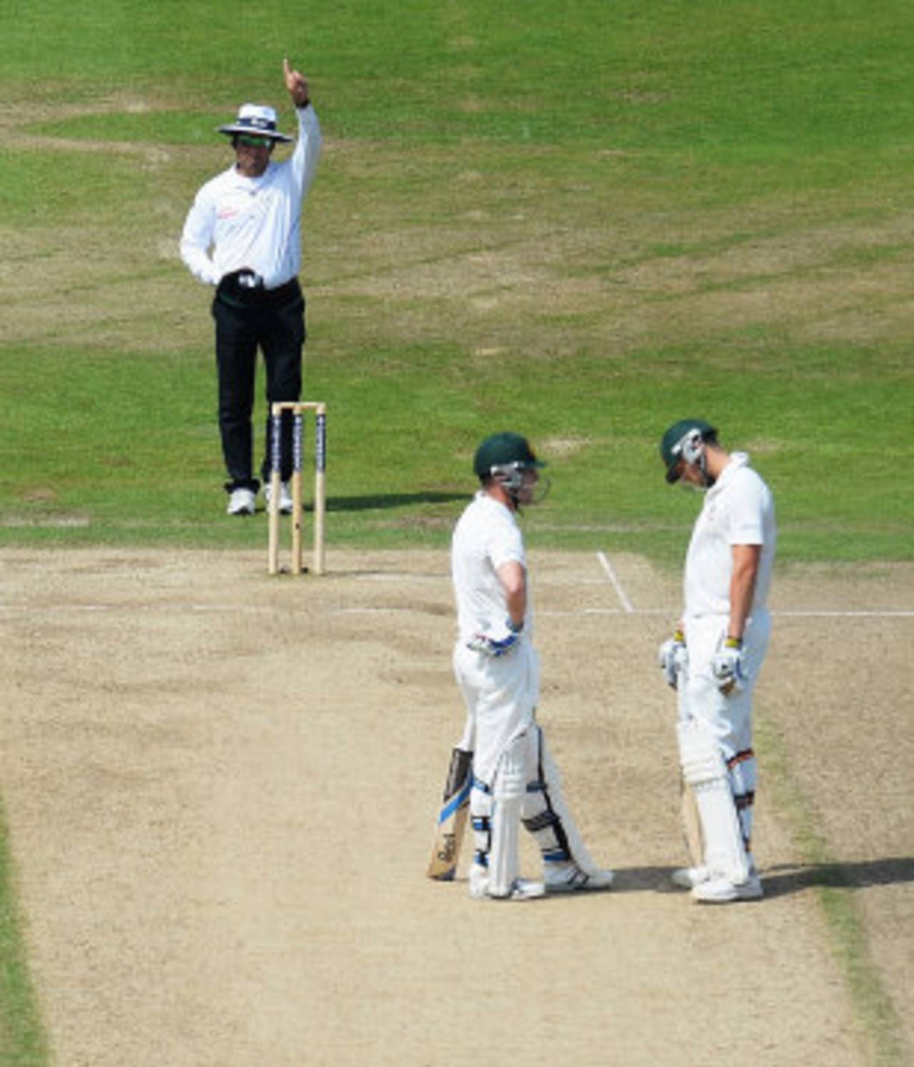 James Pattinson (right) bows his head as Aleem Dar gives the final decision, England v Australia, 1st Investec Test, Trent Bridge, 5th day, July 14, 2013