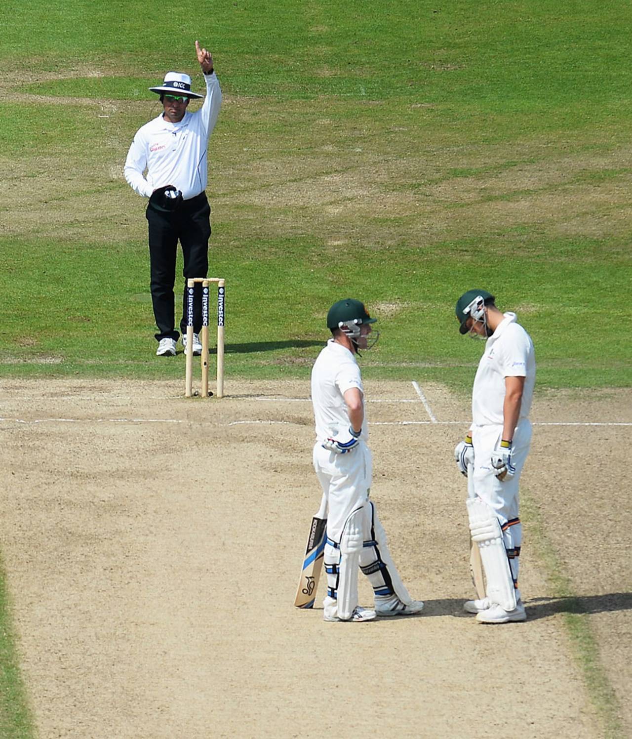 James Pattinson (right) bows his head as Aleem Dar gives the final decision, England v Australia, 1st Investec Test, Trent Bridge, 5th day, July 14, 2013