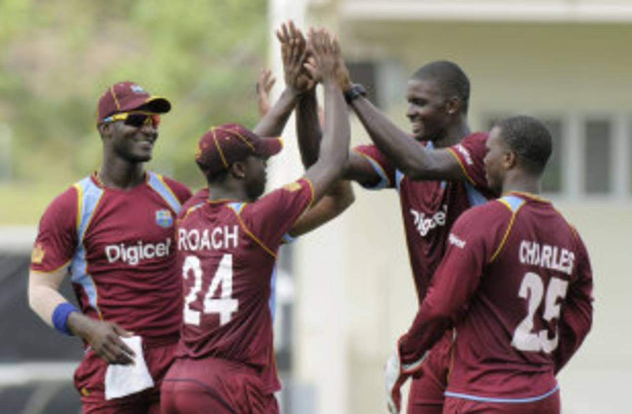 Jason Holder and Kemar Roach were celebrating at the end of the match as well, after hitting 14 runs in the final over to tie the game&nbsp;&nbsp;&bull;&nbsp;&nbsp;WICB