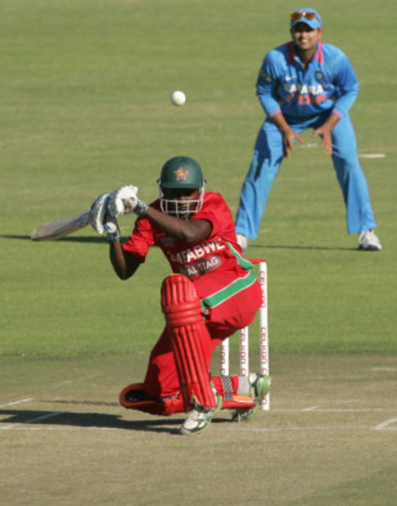 Elton Chigumbura evades a bouncer, Zimbabwe v India, 2nd ODI, Harare, July 26, 2013