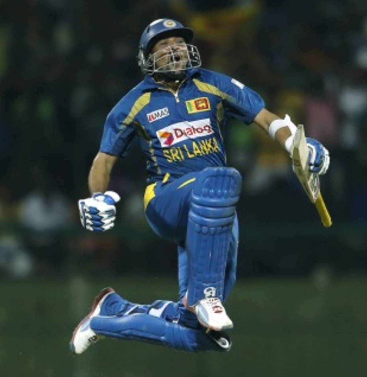 Tillakaratne Dilshan leaps for joy on reaching his century, Sri Lanka v South Africa, 4th ODI, Pallekele, July 28, 2013