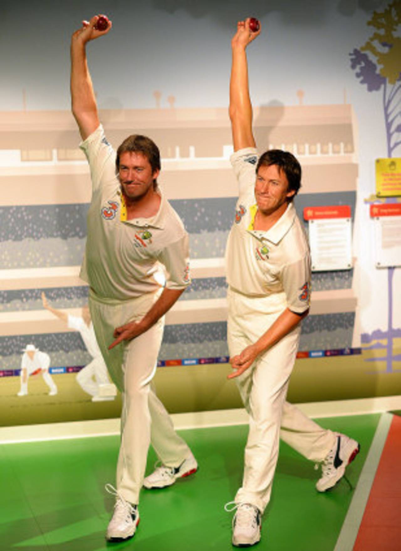 Glenn McGrath imitates the pose of a wax statue of himself at Madame Tussauds, Sydney, July 31, 2013 