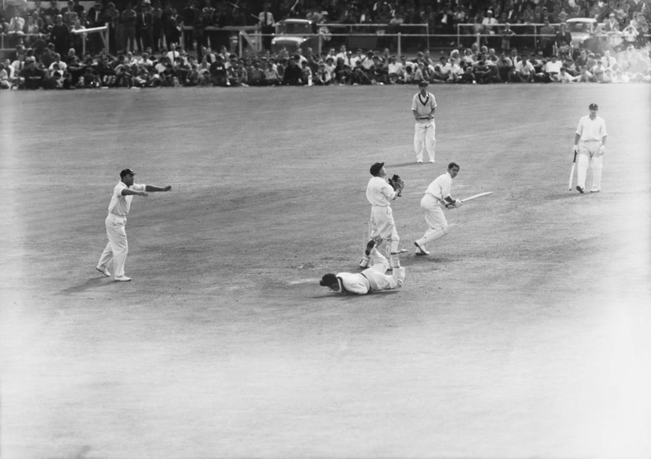 Bob Simpson dives to dismiss David Allen, England v Australia, Old Trafford, 1961&nbsp;&nbsp;&bull;&nbsp;&nbsp;Getty Images