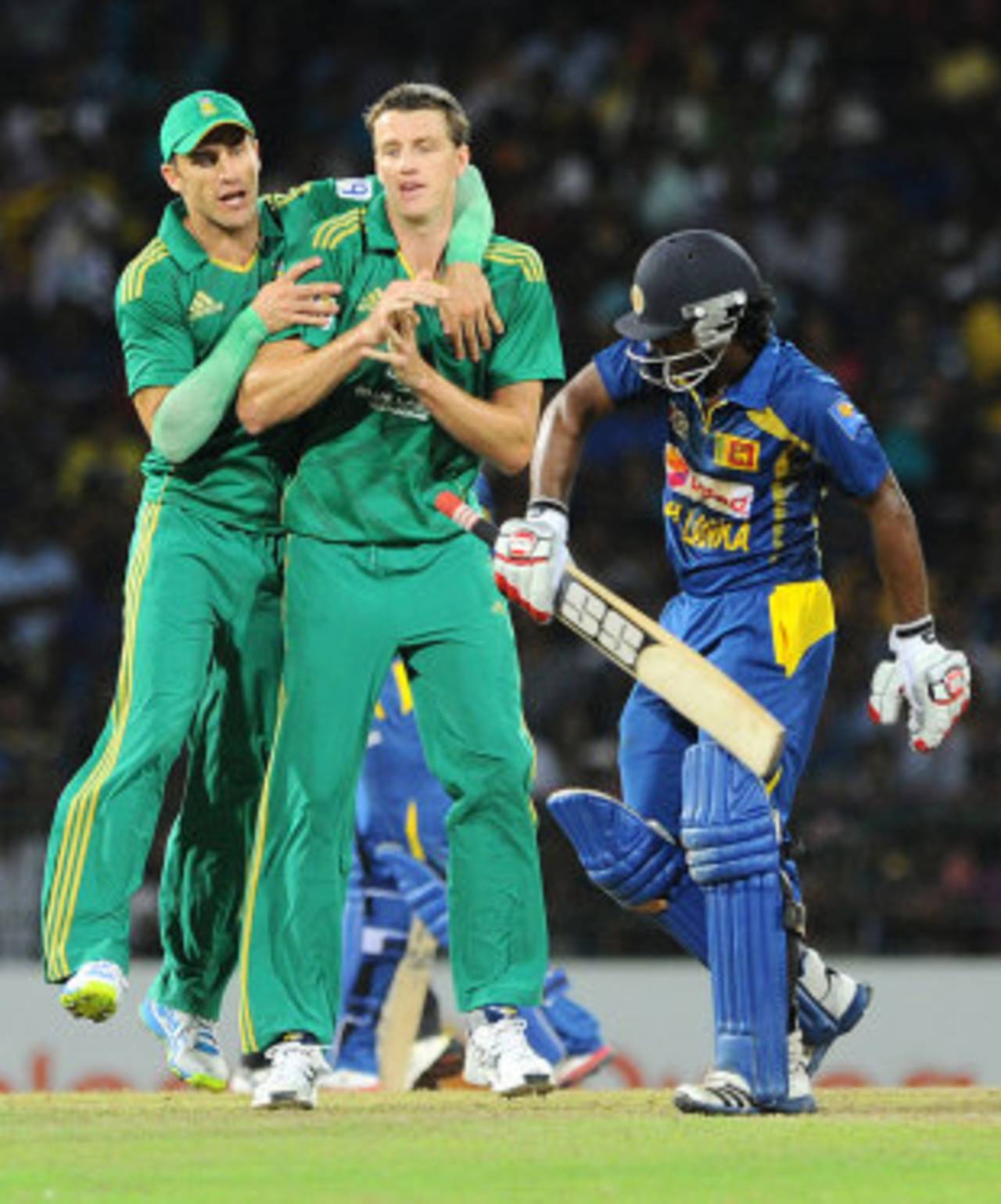 Morne Morkel celebrates with Faf du Plessis after dismissing Kusal Perera, Sri Lanka v South Africa, 1st T20, Colombo, August 2, 2013