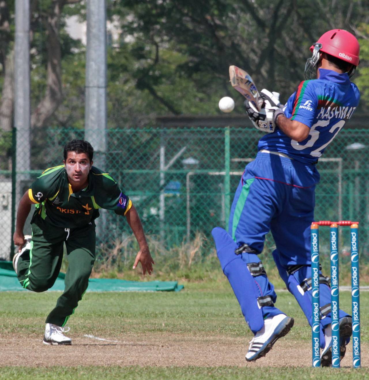 Bilawal Bhatti bowls a short ball at Hashmatullah Shaidi , Afghanistan Under-23s v Pakistan Under-23s, Group A, Asian Cricket Council Emerging Teams Cup, Singapore, August 19, 2013