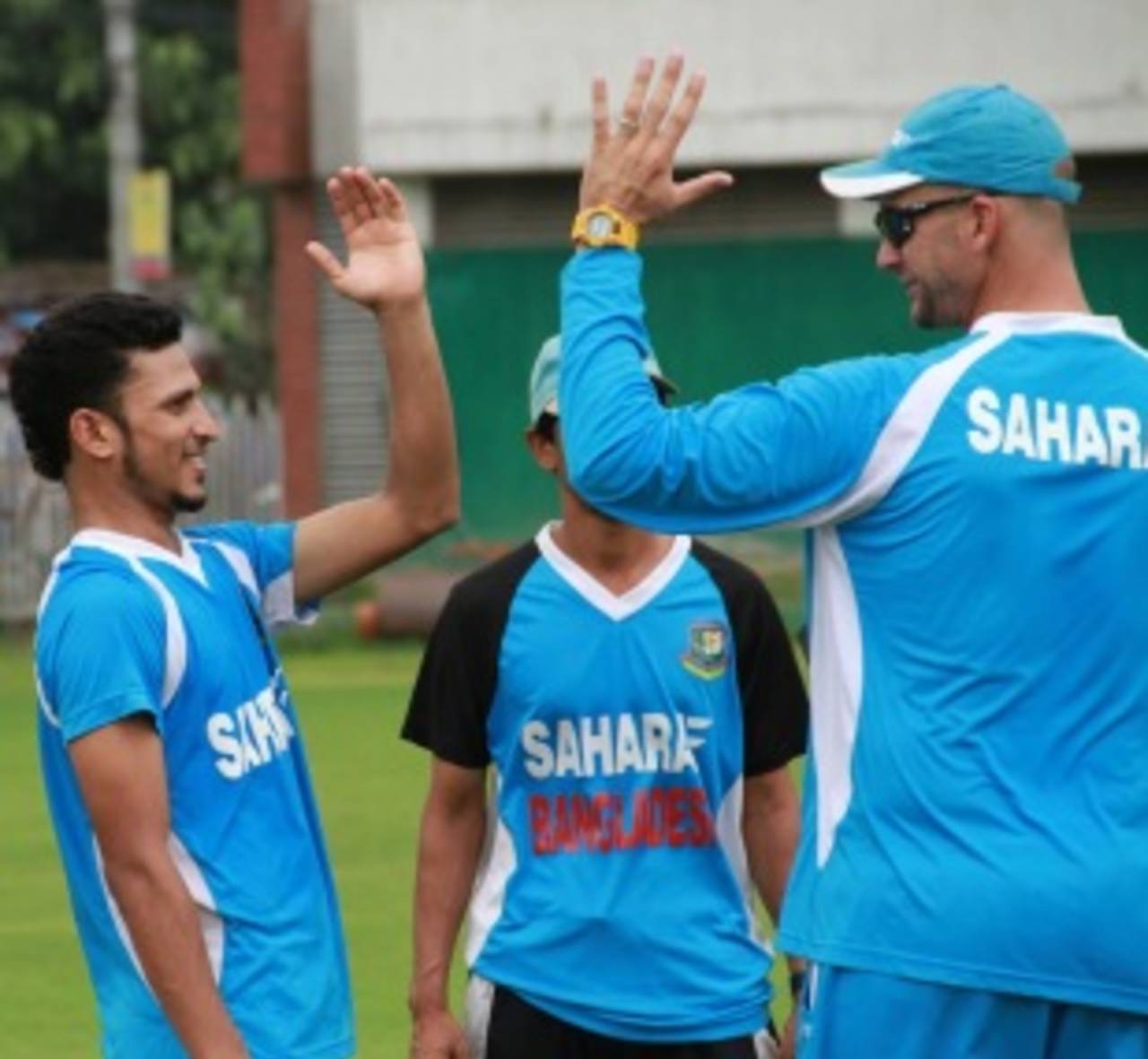 Nasir Hossain and Shane Jurgensen chat while training, Mirpur, August 21, 2013
