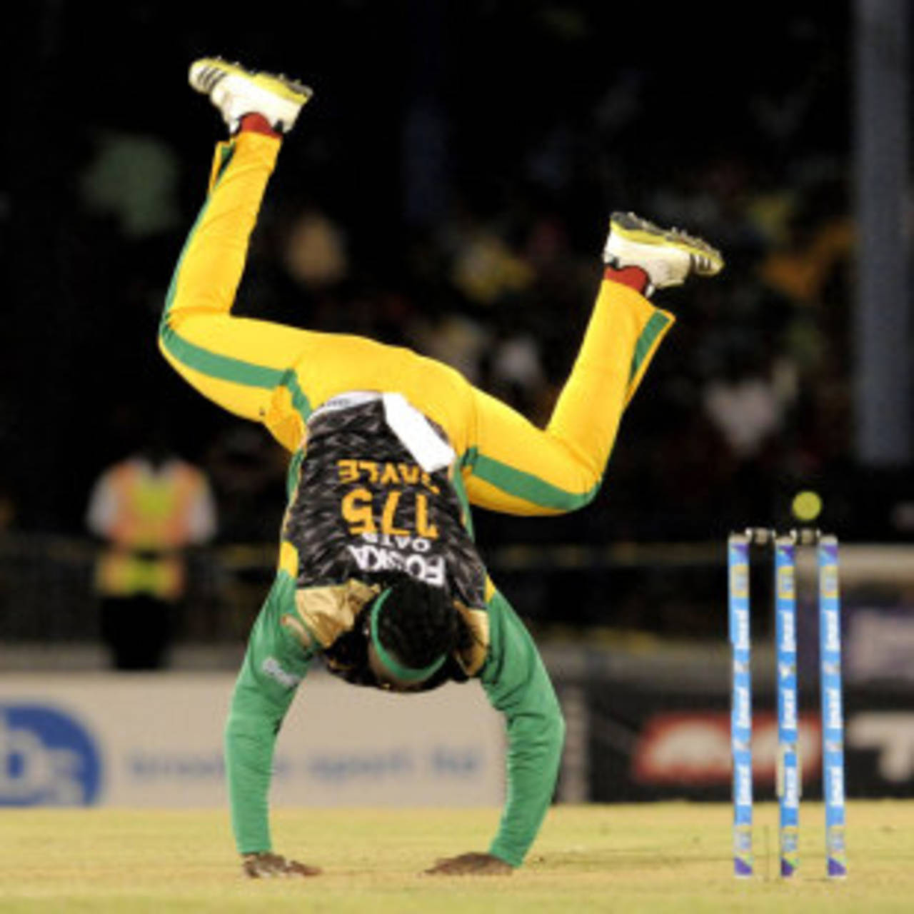 An off-balance Chris Gayle tries to regain his footing, Jamaica Tallawahs v Guyana Amazon Warriors, Caribbean Premier League 2013, final, Port-of-Spain, August 24, 2013