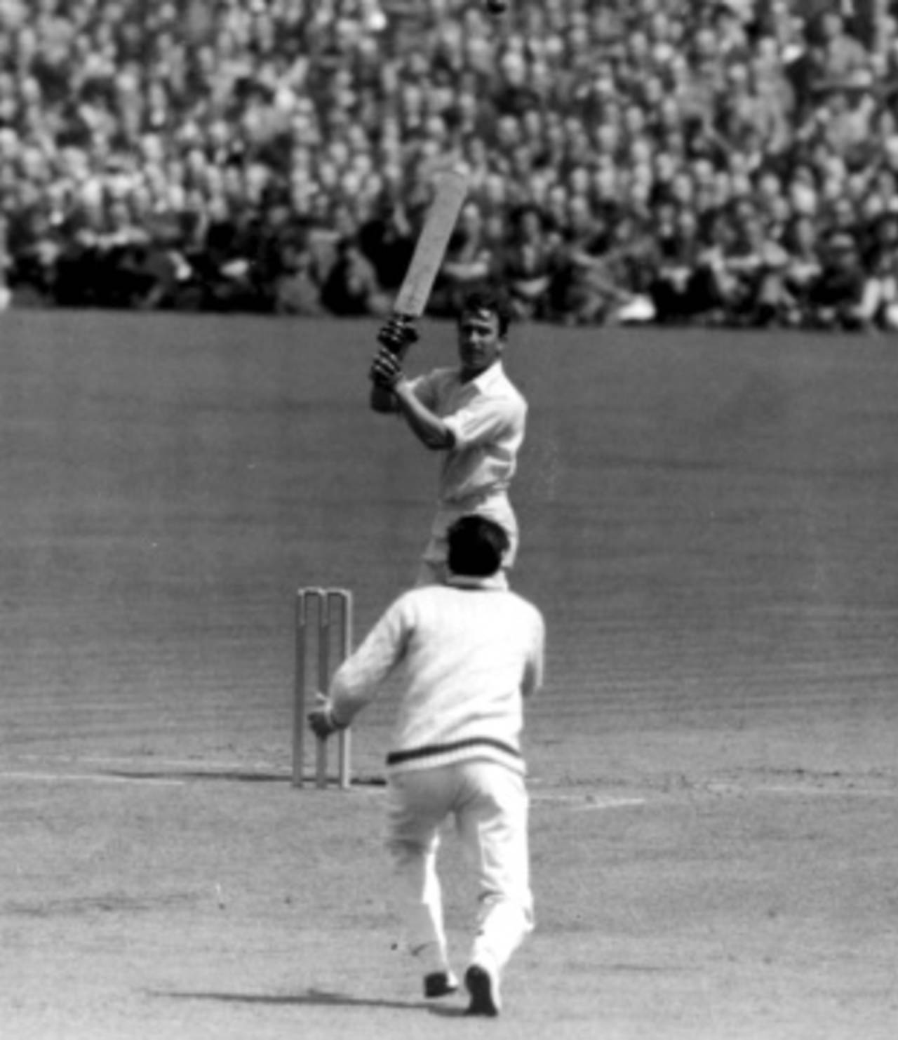 Denis Compton plays a bouncer from Ray Lindwall despite being hit on the face by the bowler previously, England v Australia, 3rd Test, Old Trafford, 1st day, July 8, 1948