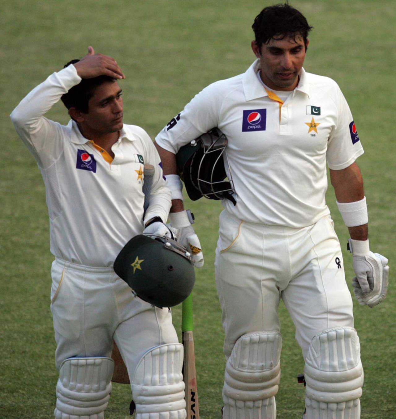 Misbah-ul-Haq and Adnan Akmal walk off the pitch at the end of the day, Zimbabwe v Pakistan, 2nd Test, Harare, 4th day, September 13, 2013