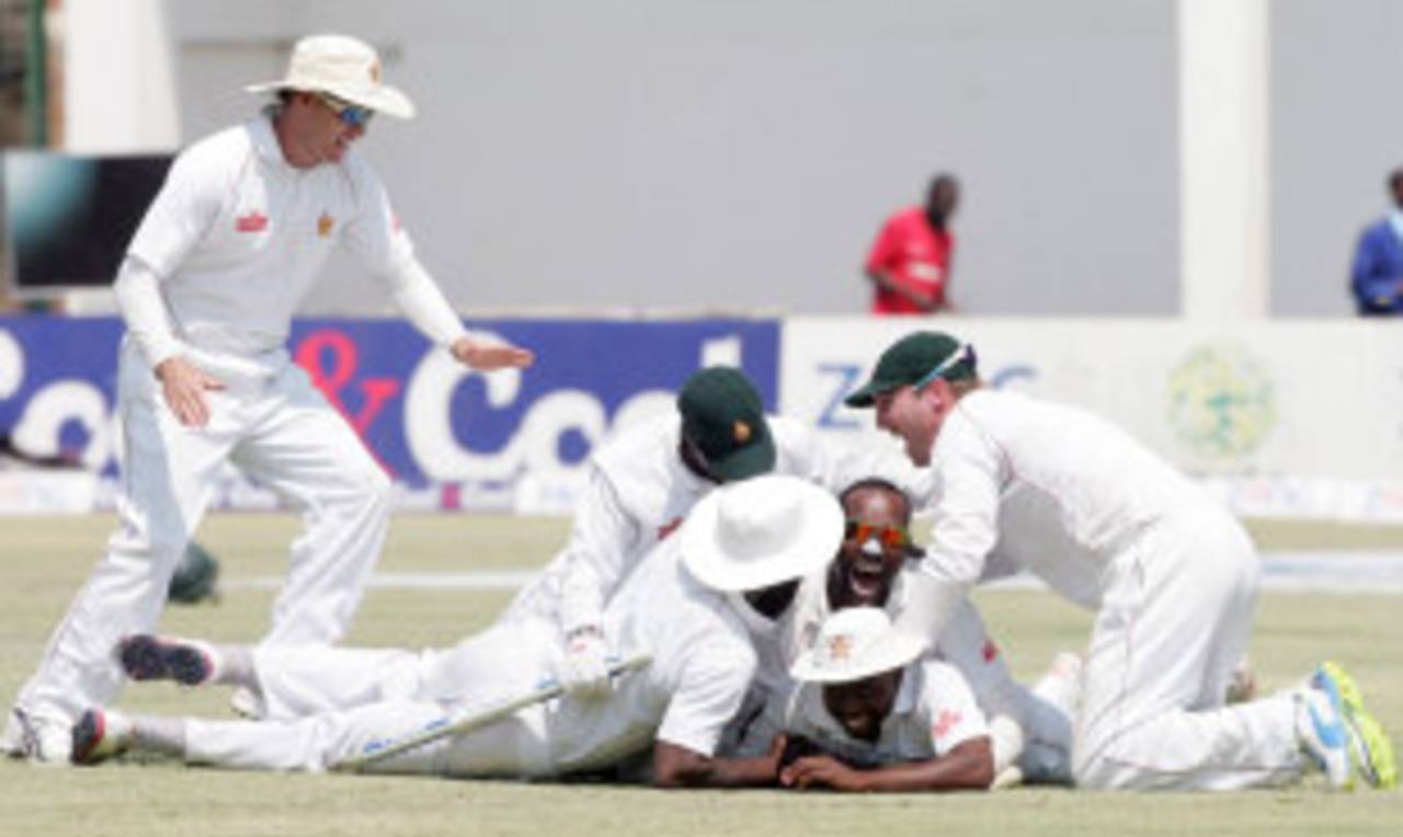 The Zimbabwe players couldn't control their joy after securing their first Test victory since 2001 against a team other than Bangladesh, Zimbabwe v Pakistan, 2nd Test, Harare, 5th day, September 14, 2013