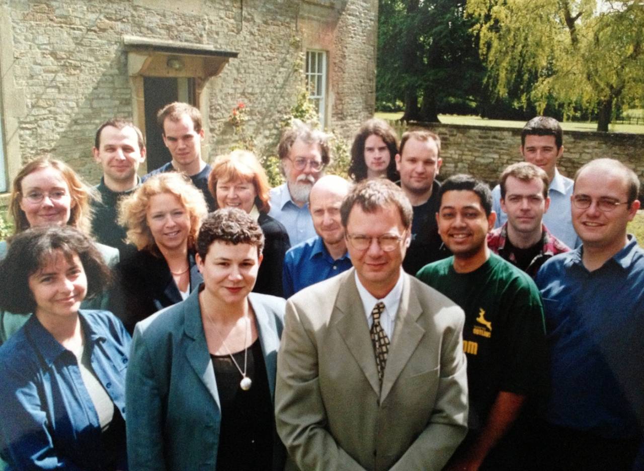 Cricinfo's staff outside their offices in Hartham Park, Wiltshire, England, in 2001. Badri Seshadri is to the left of Simon King (front, centre)