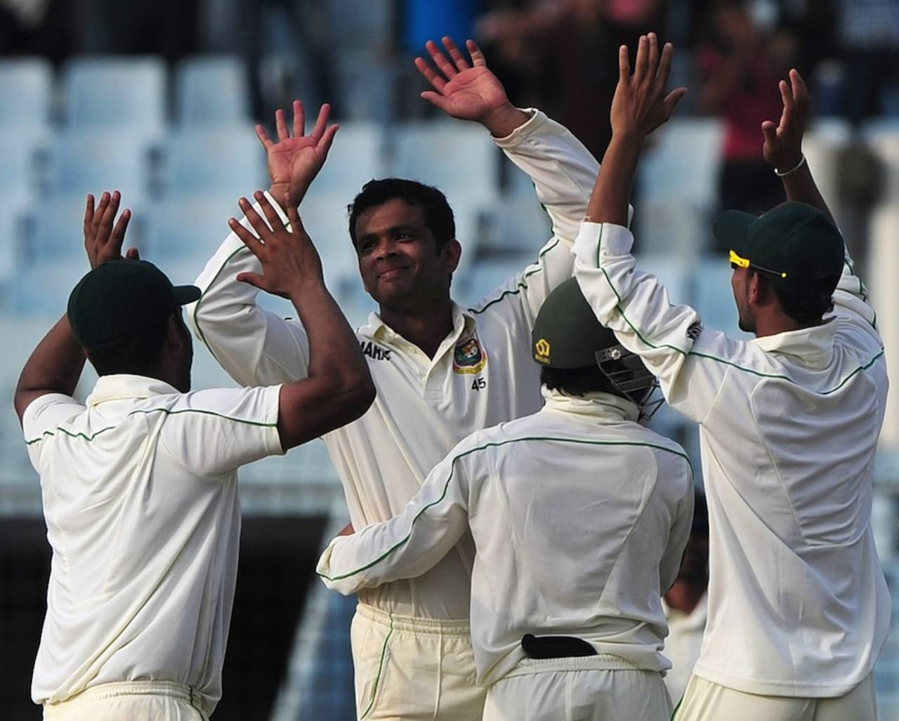 Abdur Razzak celebrates the wicket of Ross Taylor&nbsp;&nbsp;&bull;&nbsp;&nbsp;AFP