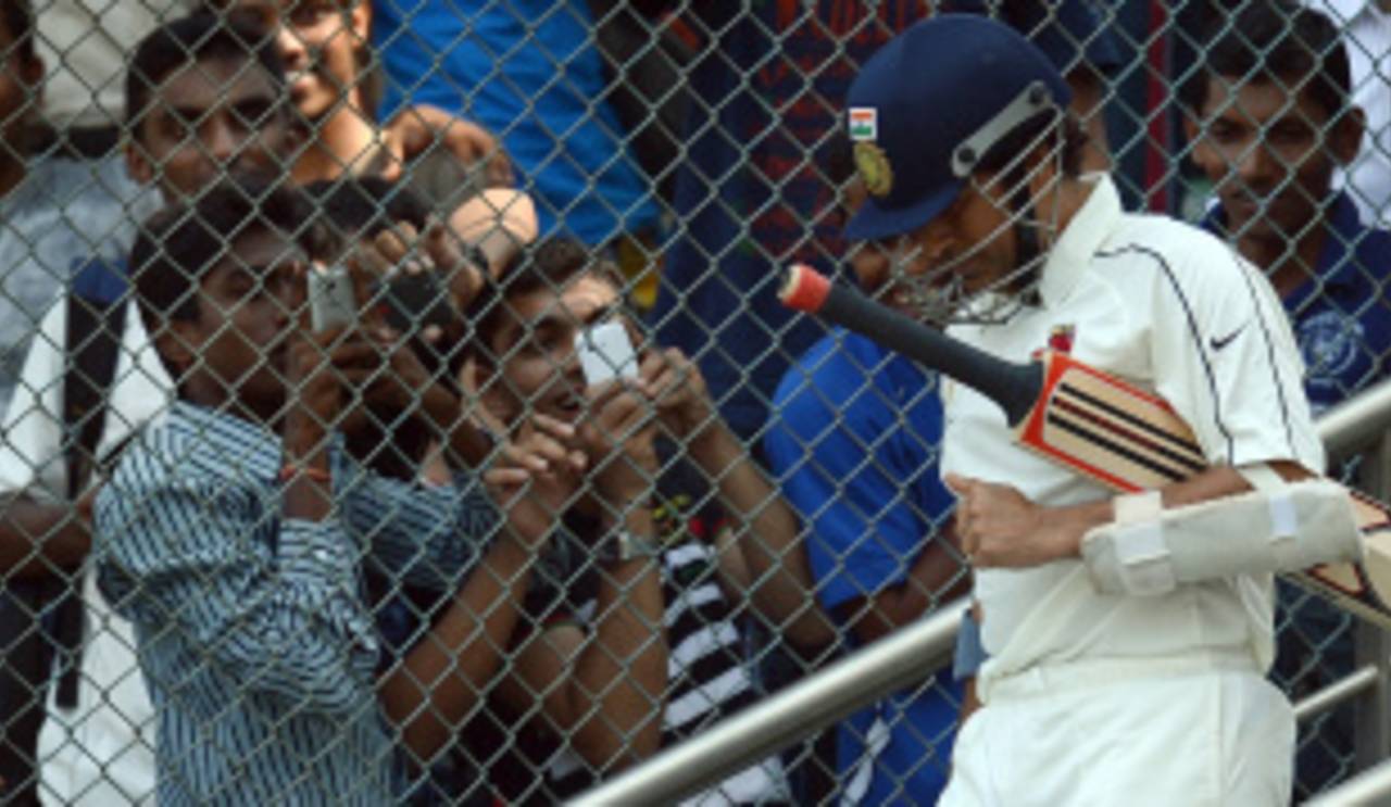 Fans take photographs of Sachin Tendulkar as he walks out to bat, Mumbai v Railways, Ranji Trophy, Group A, 1st day, Mumbai, November 2, 2012