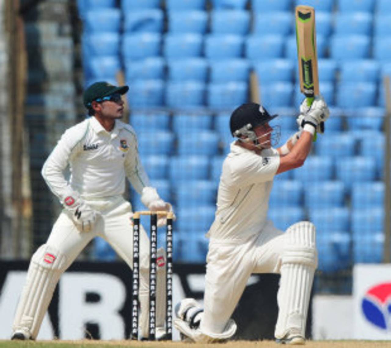 Trent Boult plays a sweep shot, Bangladesh v New Zealand, 1st Test, Chittagong, 2nd day, October 10, 2013