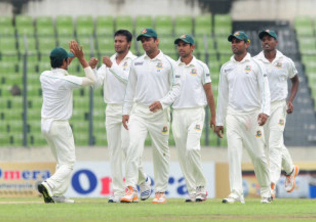 Just to make sure any fan still watching gives up, Bangladesh put on a show of how to mess up a high-five&nbsp;&nbsp;&bull;&nbsp;&nbsp;AFP