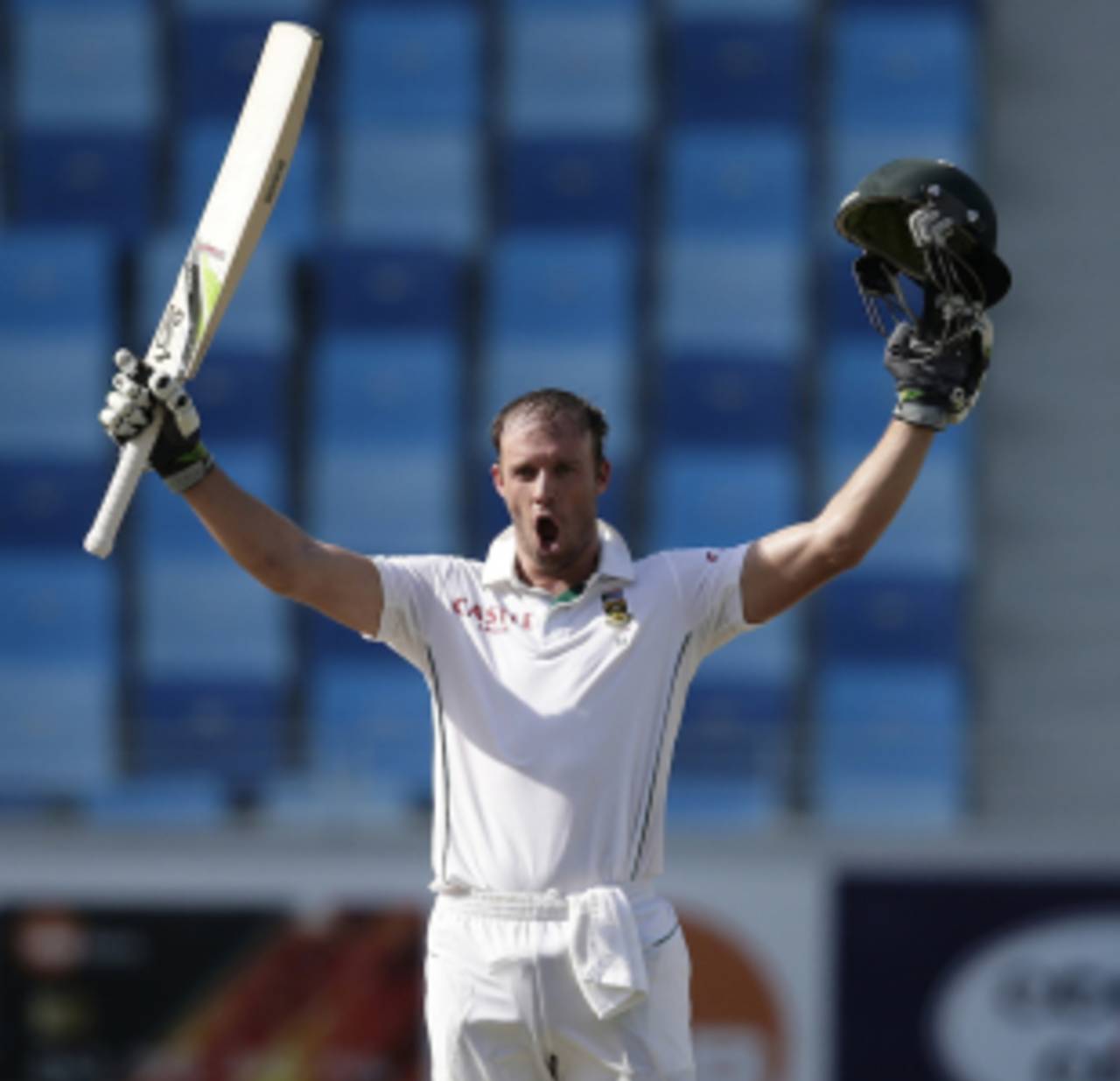 AB de Villiers raises his arms after reaching his ton, Pakistan v South Africa, 2nd Test, Dubai, 2nd day, October 24, 2013
