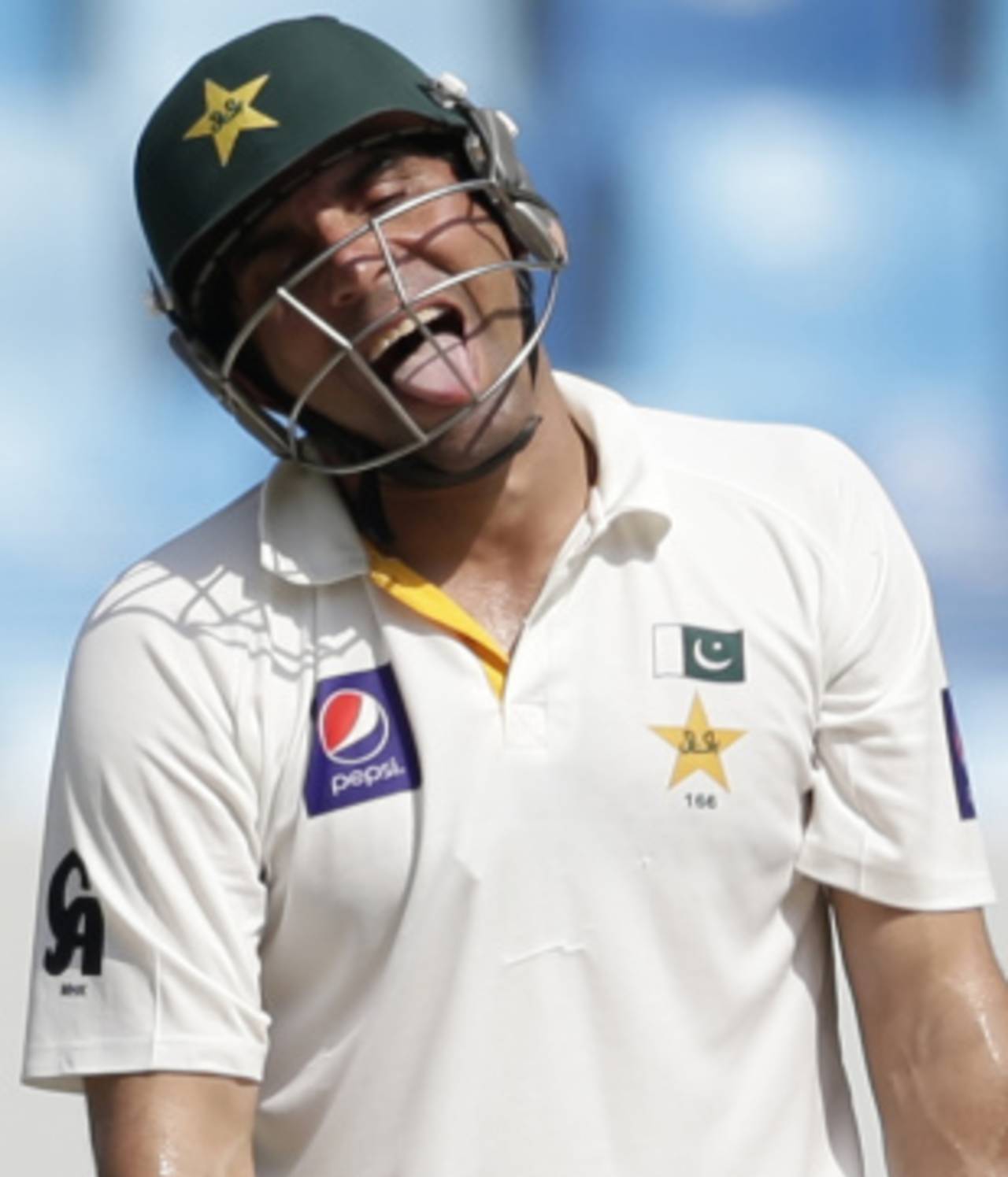 Misbah-ul-Haq reacts after missing a delivery, Pakistan v South Africa, 2nd Test, Dubai, 4th day, October 26, 2013