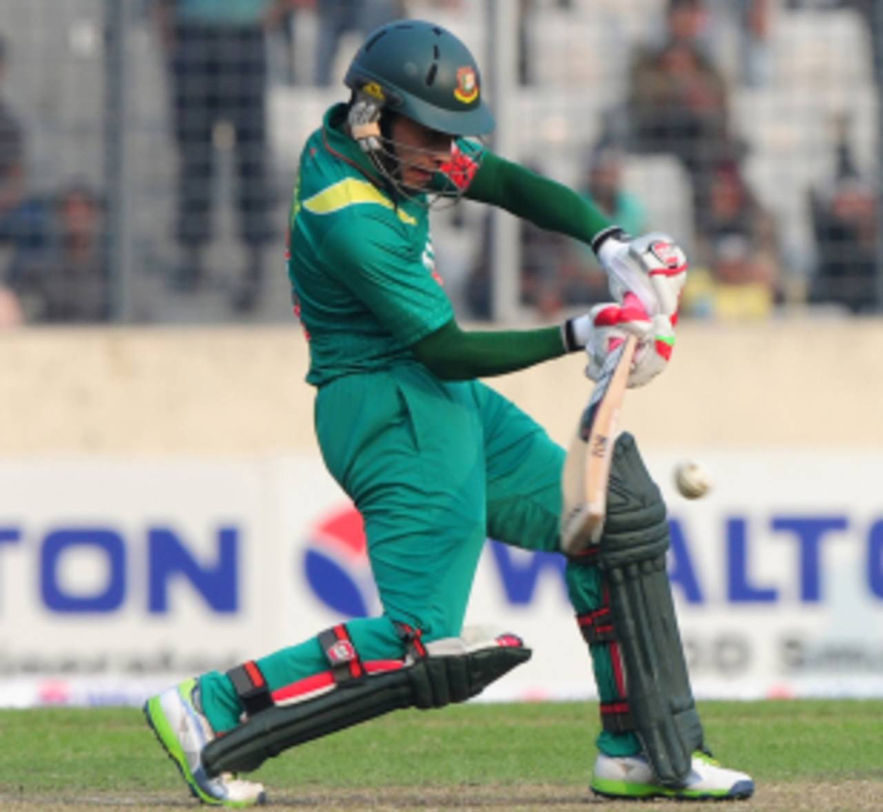 Mushfiqur Rahim shapes to play a drive, Bangladesh v New Zealand, 2nd ODI, Mirpur, October 31, 2013