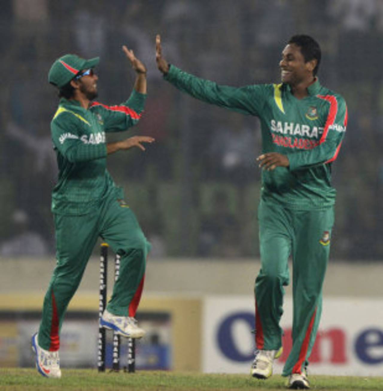 Mominul Haque and Sohag Gazi celebrate James Neesham's wicket, Bangladesh v New Zealand, 2nd ODI, Mirpur, October 31, 2013