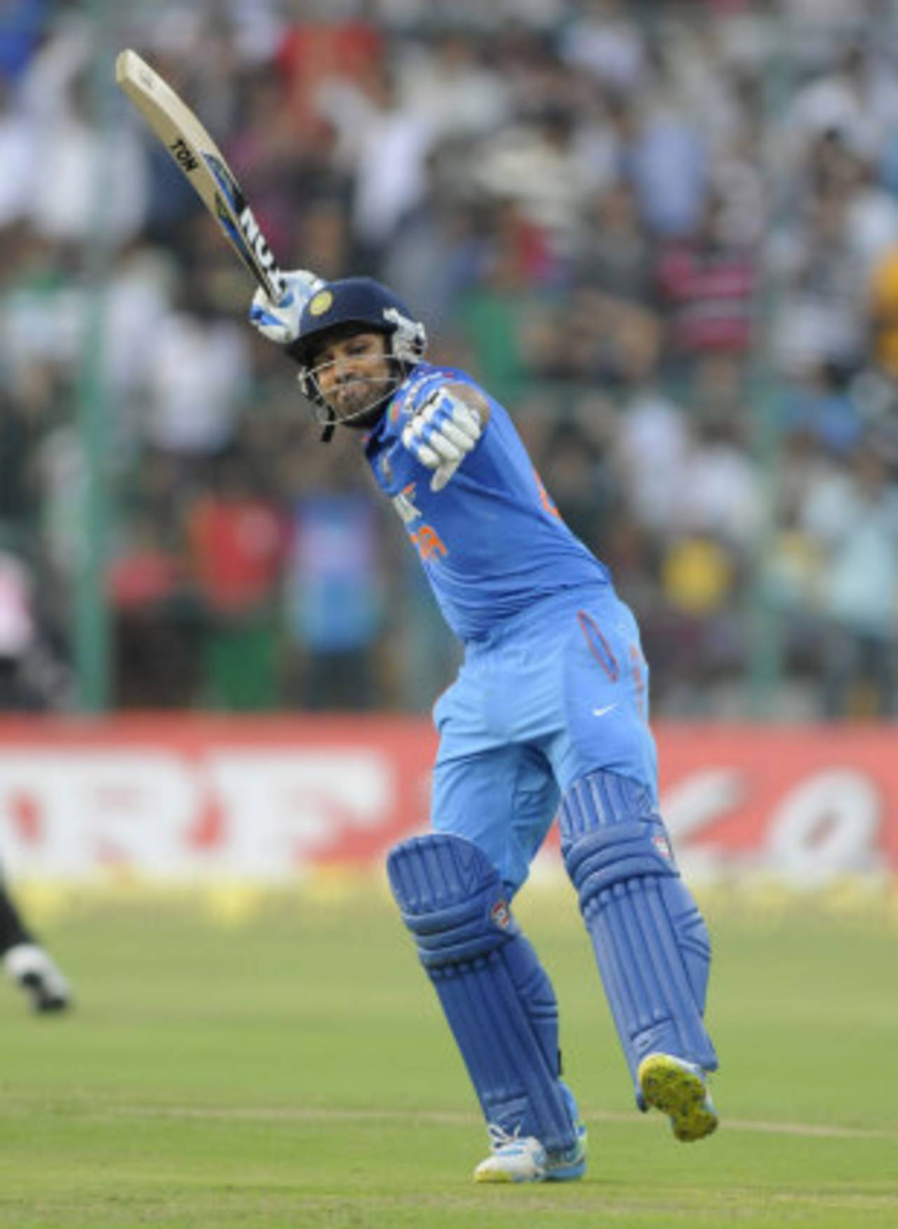 Rohit Sharma exults after reaching his century, India v Australia, 7th ODI, Bangalore, November 2, 2013