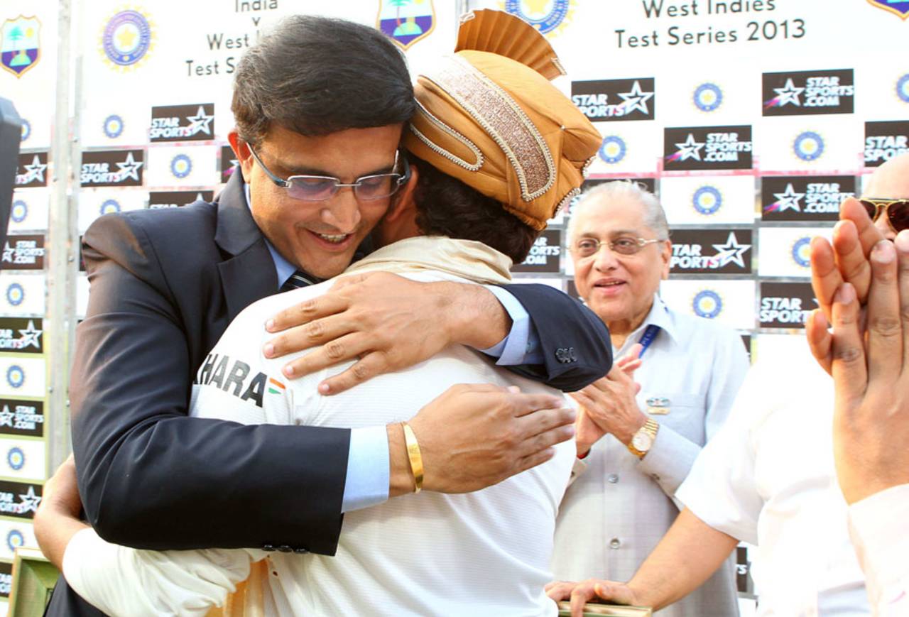 Sourav Ganguly and Sachin Tendulkar embrace after India's win, India v West Indies, 1st Test, Kolkata, 3rd day, November 8, 2013
