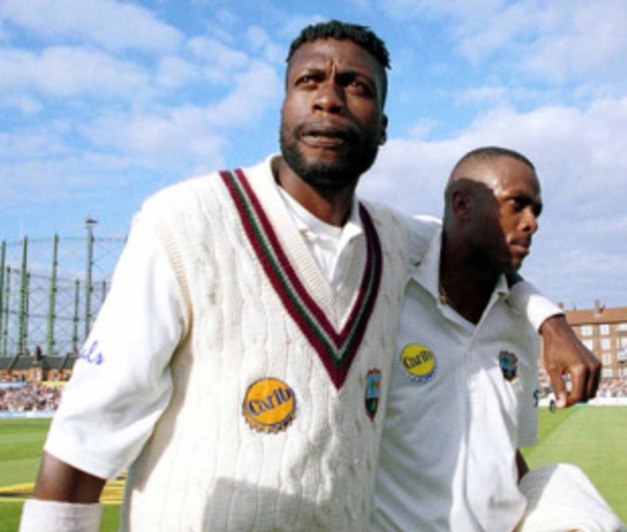 Courtney Walsh [right] leaves the field with Curtly Ambrose in 2000, as West Indies relinquish the Wisden Trophy, which was finally reclaimed in the Caribbean in March&nbsp;&nbsp;&bull;&nbsp;&nbsp;Getty Images