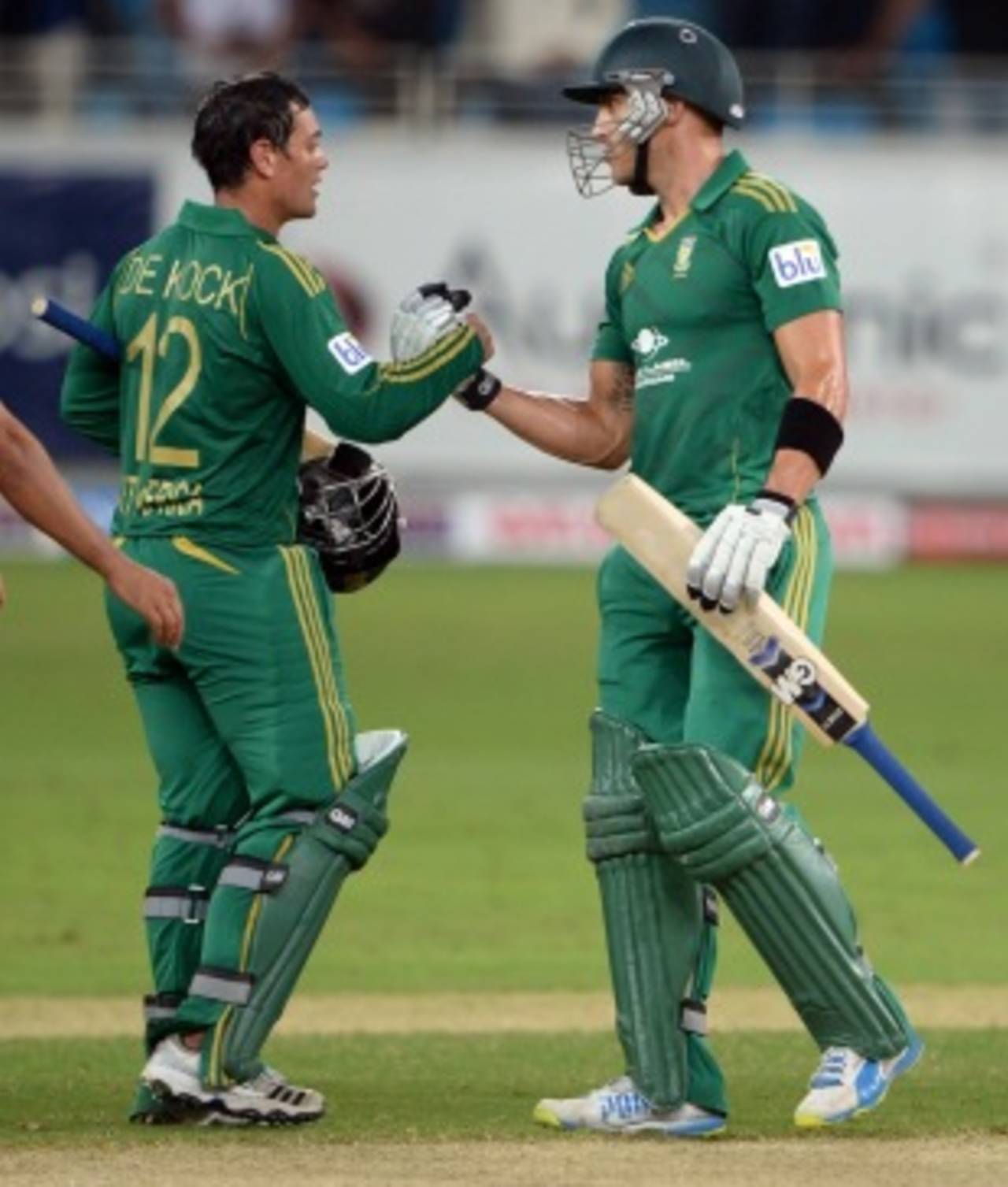 Quinton de Kock and Faf du Plessis celebrate the win, Pakistan v South Africa, 1st T20I, Dubai, November 13, 2013
