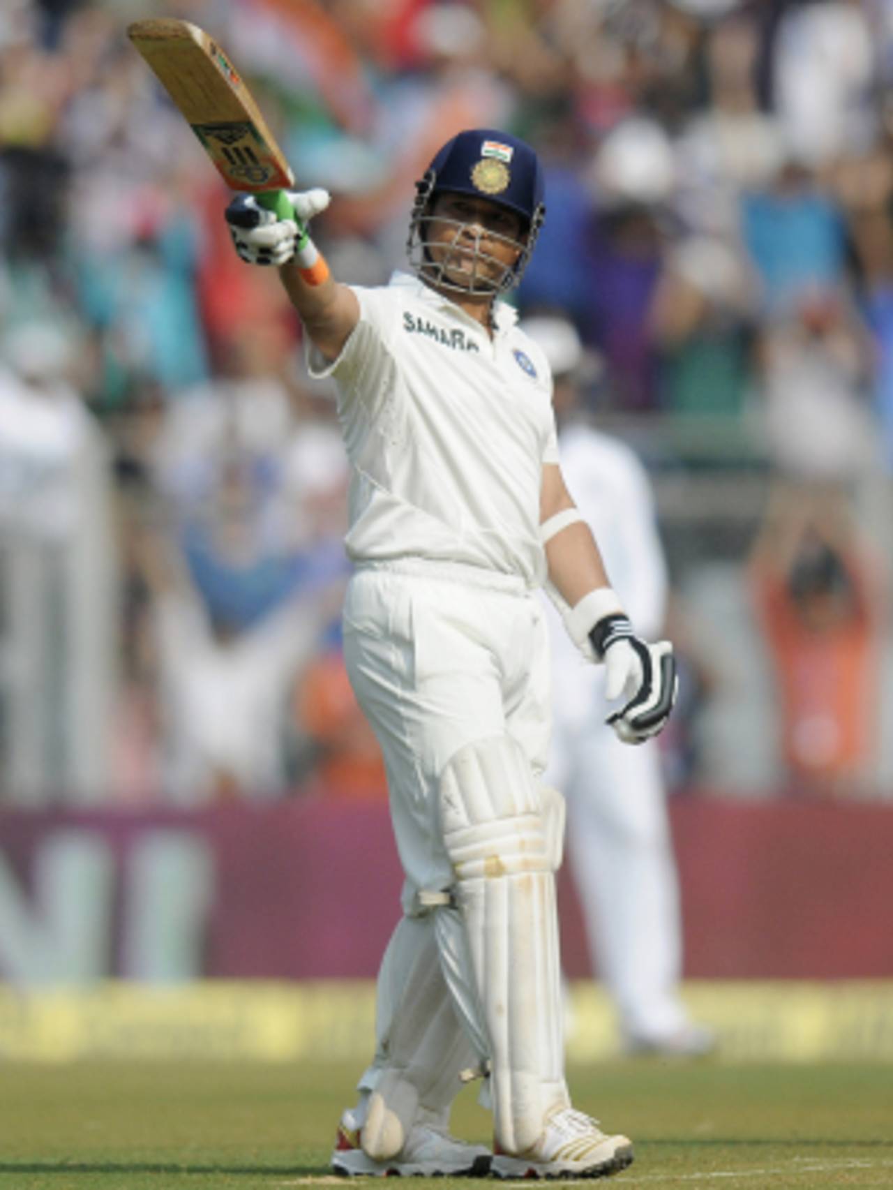 Sachin Tendulkar raises his bat on reaching his fifty, India v West Indies, 2nd Test, Mumbai, 2nd day, November 15, 2013