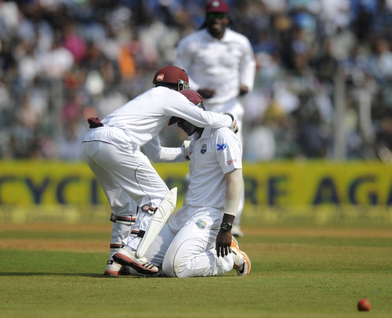 Denesh Ramdin embraces Darren Sammy, who caught Sachin Tendulkar, India v West Indies, 2nd Test, Mumbai, 2nd day, November 15, 2013