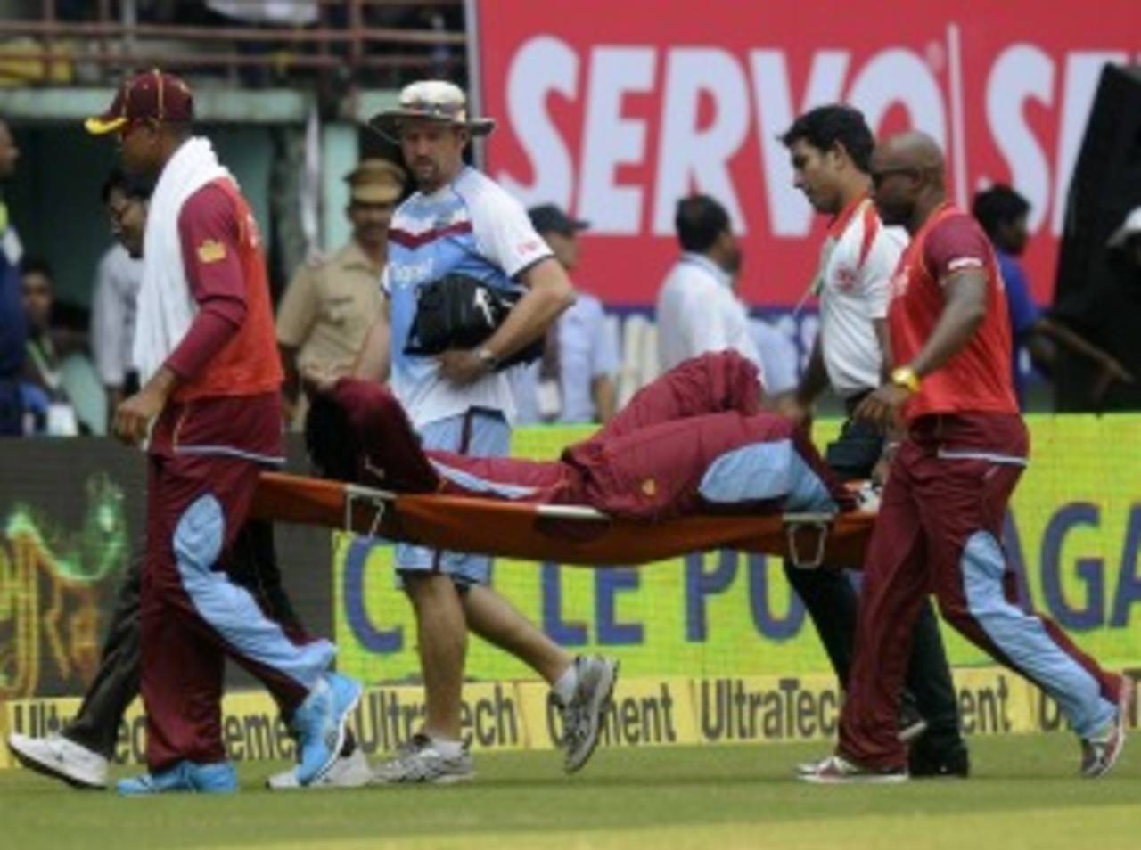 Chris Gayle was taken off the field on a stretcher, India v West Indies, 1st ODI, Kochi, November 21, 2013