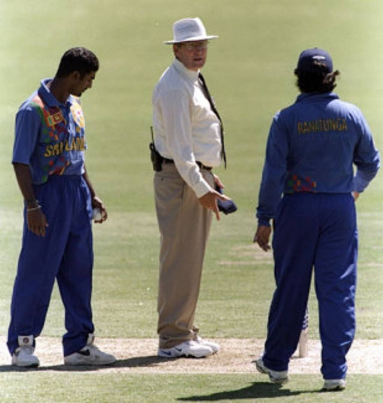 Muttiah Muralitharan and Arjuna Ranatunga argue with Ross Emerson after a no-ball incident, England v Sri Lanka, Adelaide, January 1999