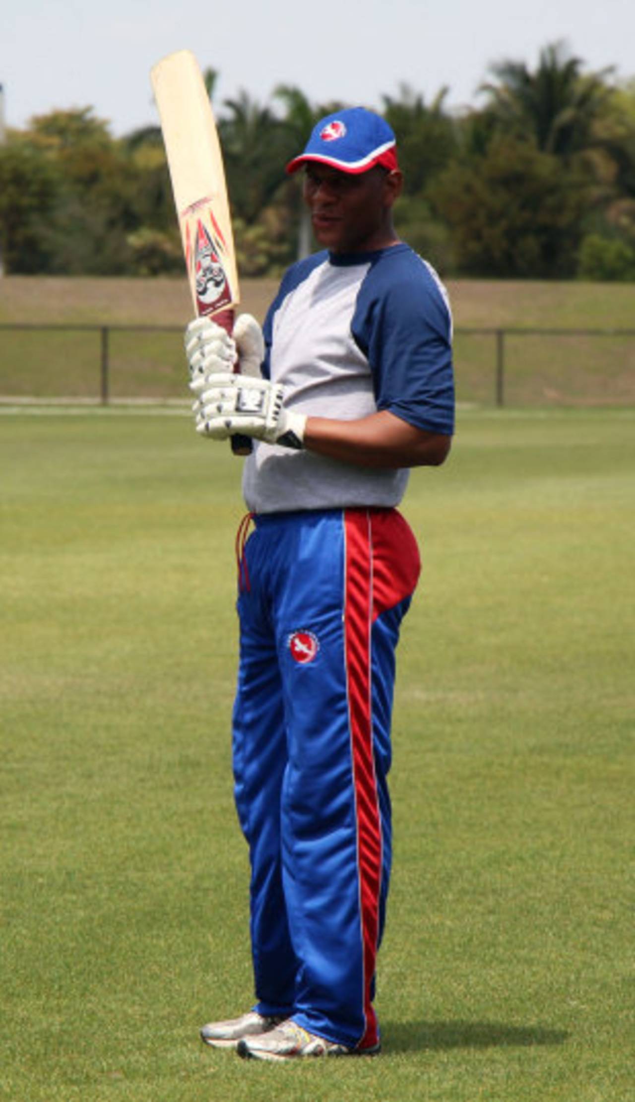 Neil McGarrell prepares to bat during a practice session, November 26, 2013