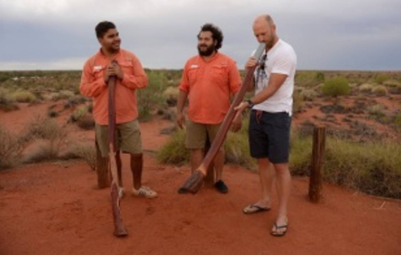 Matt Prior has a go on a didgeridoo, Ayers Rock, November 27, 2013