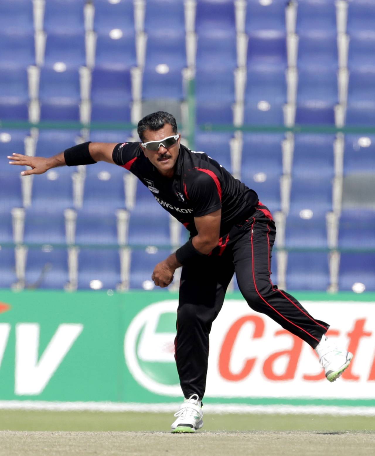 Moner Ahmed bowling during the Papua New Guinea v Hong Kong Qualifying Final match at the ICC World Twenty20 Qualifiers at the Zayed Cricket Stadium on November 28, 2013 in Abu Dhabi, United Arab Emirates. (Photo by Graham Crouch-IDI/IDI via Getty Images)