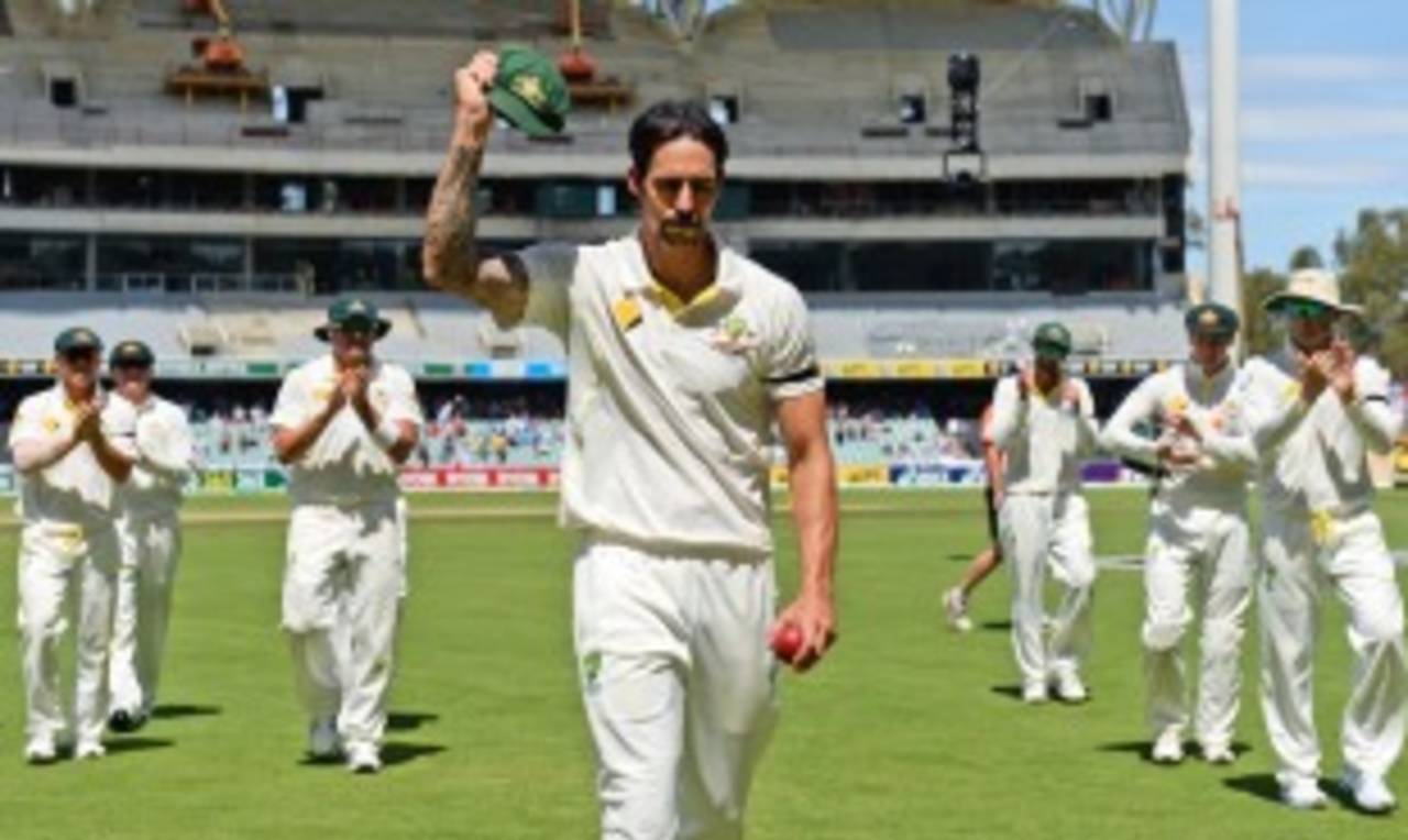 Mitchell Johnson leads the Australians off after taking 7 for 40, Australia v England, 2nd Test, Adelaide, 3rd day, December 7, 2013