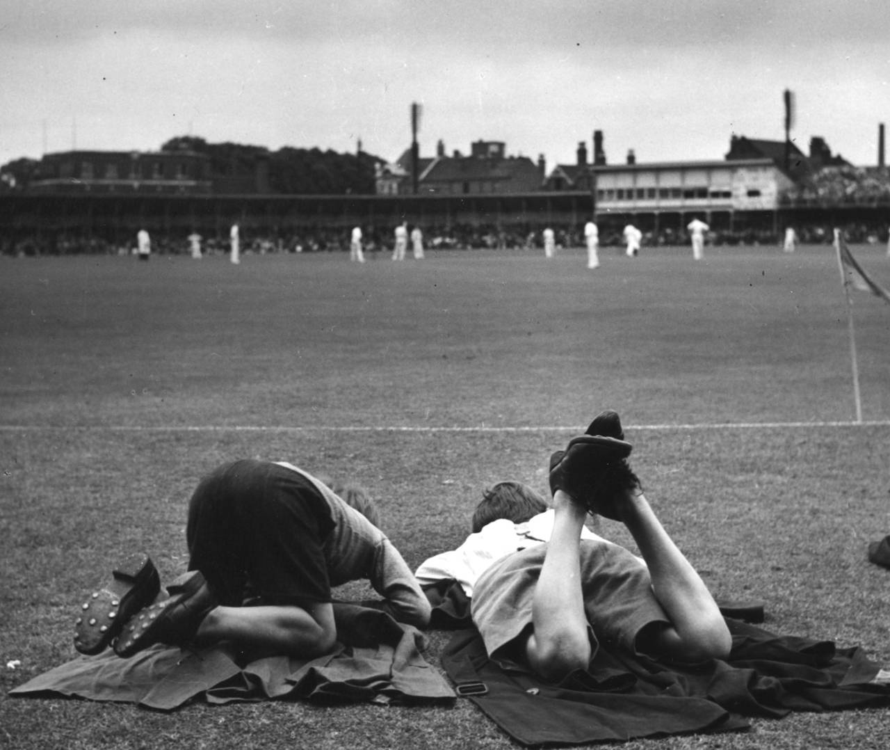 Two young members of the the ground staff watch the game, Nottinghamshire v Surrey, County Championship, Trent Bridge, 1st day, June 4, 1949