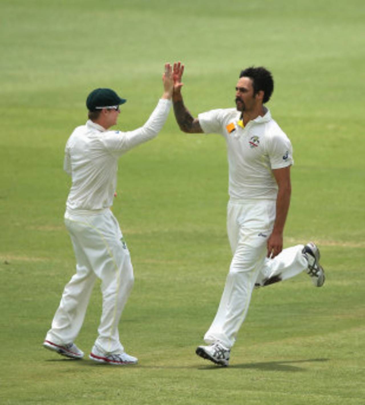 Mitchell Johnson gets a high five from Steven Smith, Australia v England, Test, Perth, 5th day, December 17, 2013
