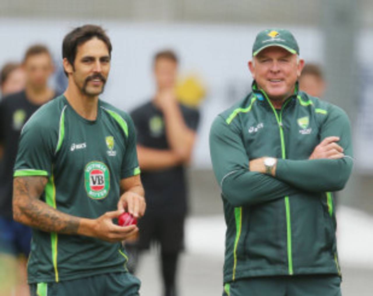 Mitchell Johnson and Craig McDermott at a training session, Melbourne, December 23, 2013