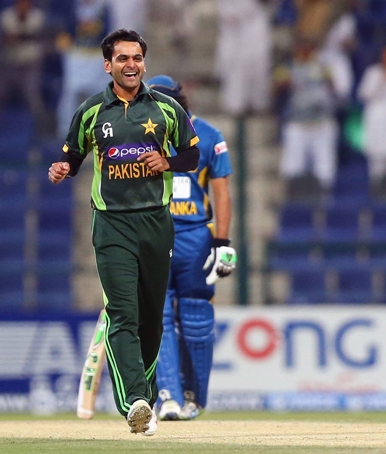 Mohammad Hafeez reacts after dismissing Kusal Perera, Pakistan v Sri Lanka, 5th ODI, Abu Dhabi, December 27, 2013
