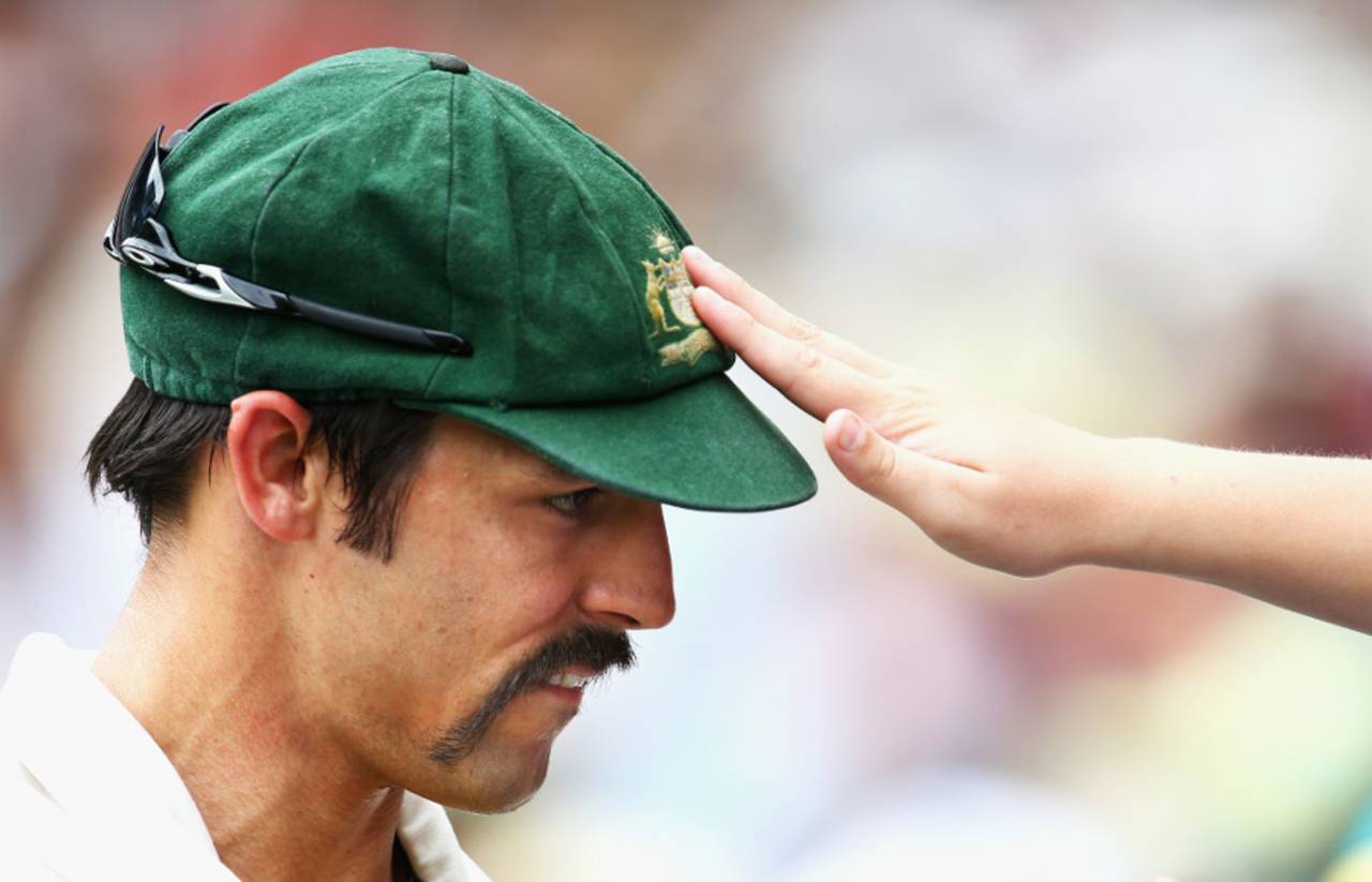 Soak up the power? A fan touches Mitchell Johnson's baggy green, Australia v England, 4th Test, Melbourne, 3rd day, December 28, 2013